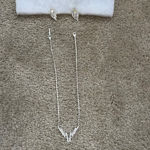 Costume jewelry necklace and earrings.